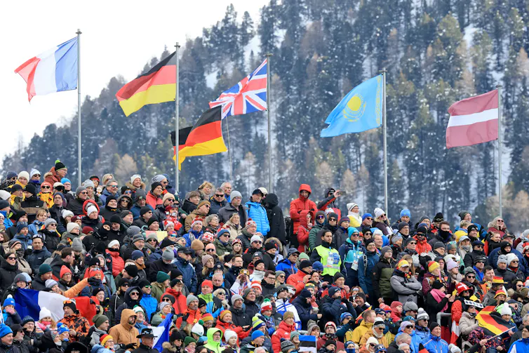 A crowd of spectators on a mountainside.