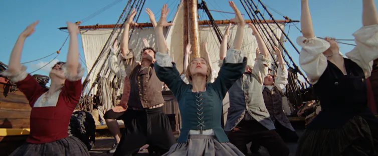Dancing on a boat.