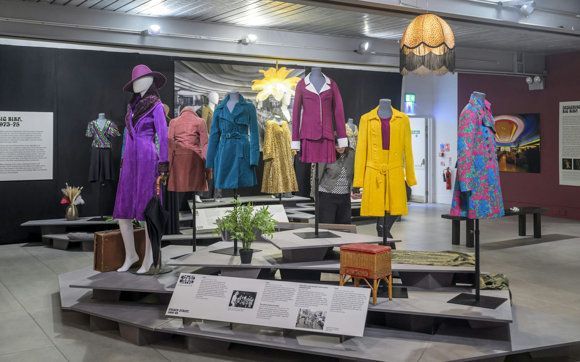 A museum exhibit of Biba clothes in bright colours.