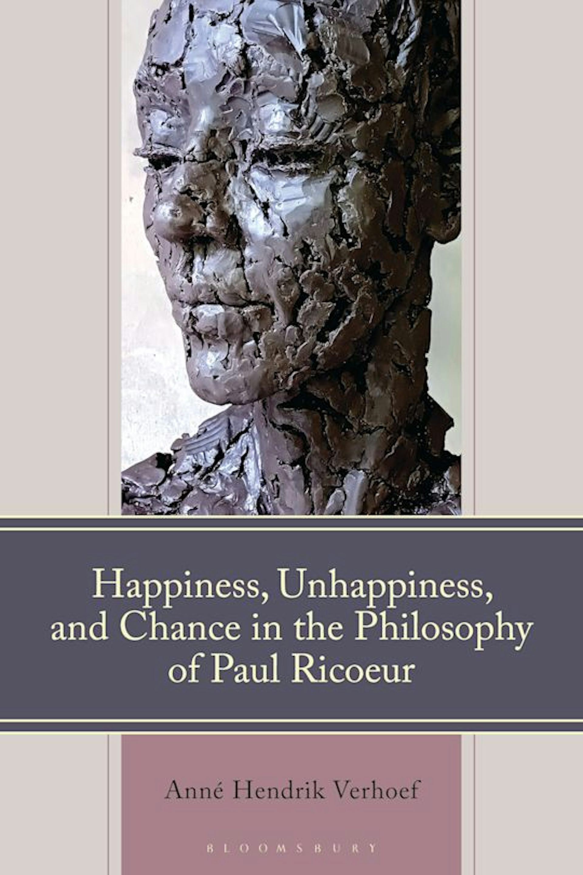 A book cover featuring a photo of a sculpture of a serene-looking human face comprised of textured pieces of clay.