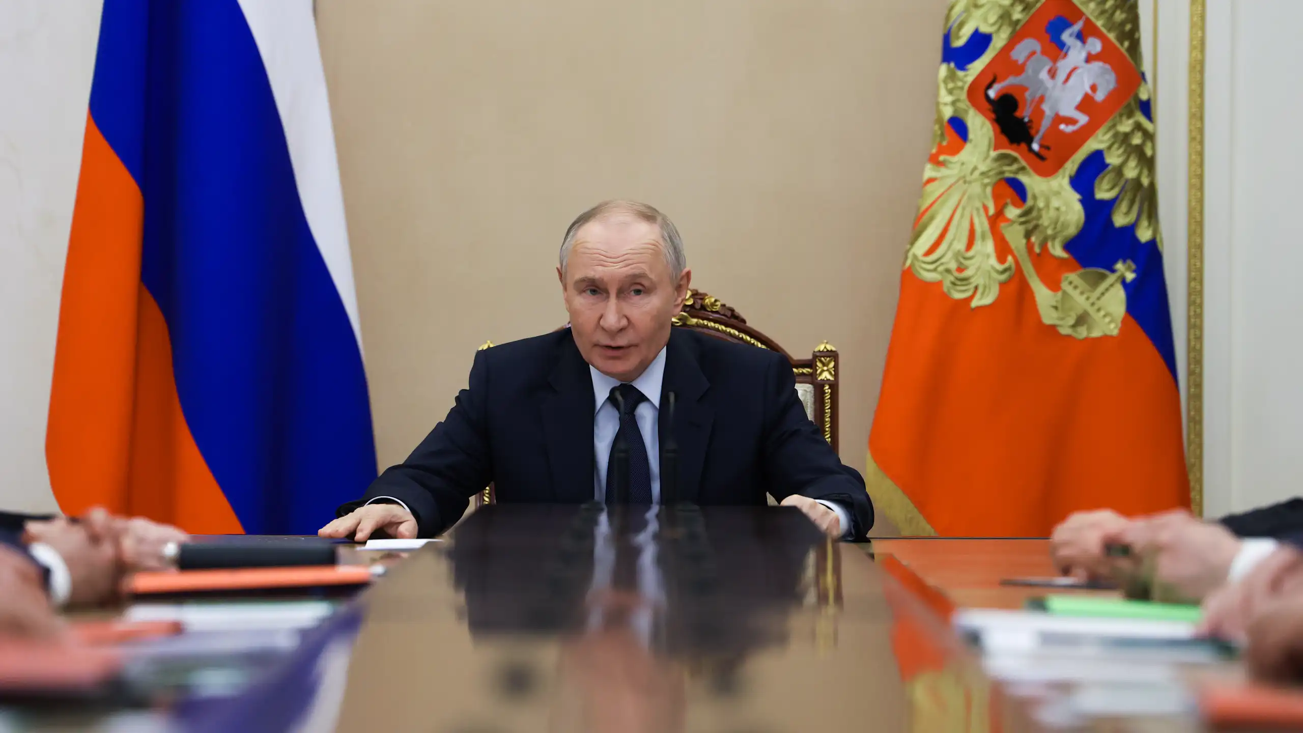 Vladimir Putin chairing a security council meeting