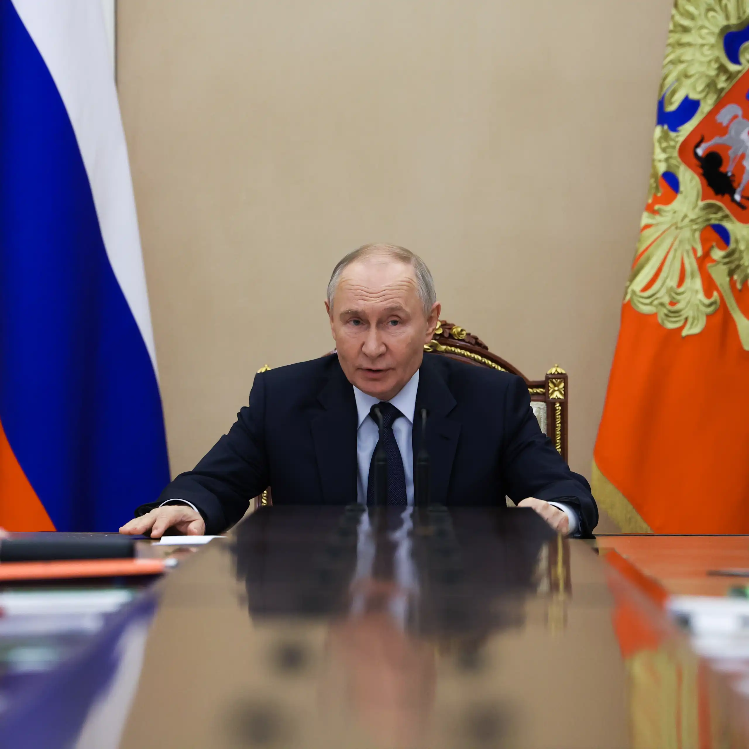 Vladimir Putin chairing a security council meeting
