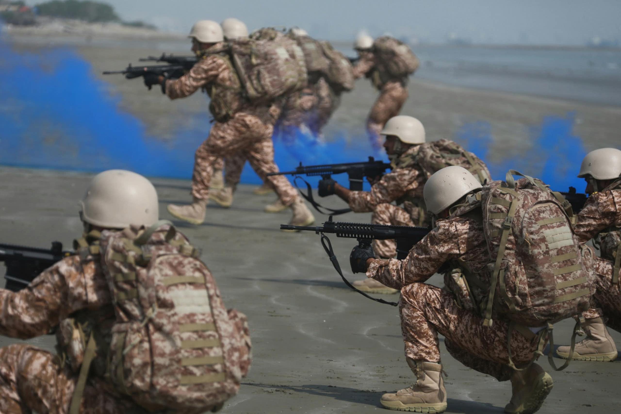 Iranian soldiers taking part in a naval exercise.