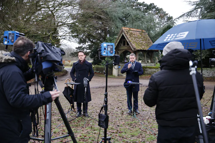 Journalists and camera crews outside of Wood Farm