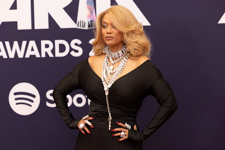 Tyra Banks posing on the red carpet.