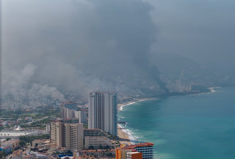 Plumes of smoke rising from Puerto Vallarta on Mexico's Pacific coast.