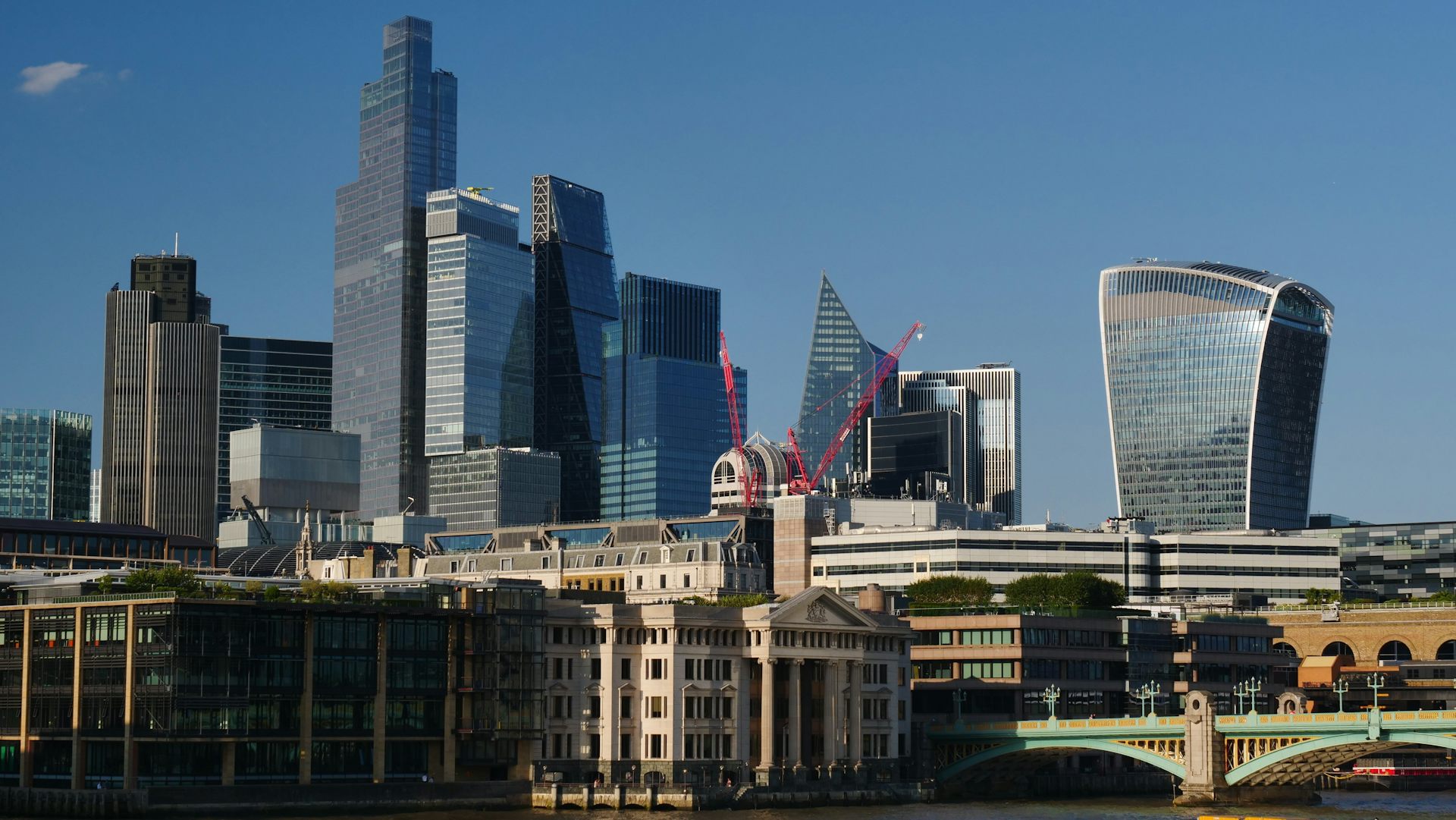 The City of London skyline on the river Thames, London.