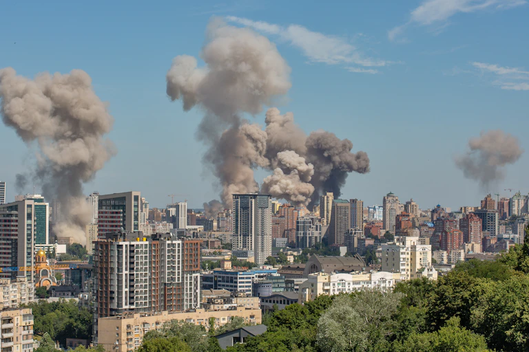 Smoke rises over downtown Kyiv after a Russian missile attack.