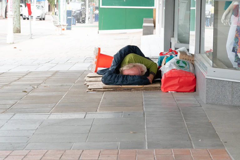 A person sleeping rough in city streets
