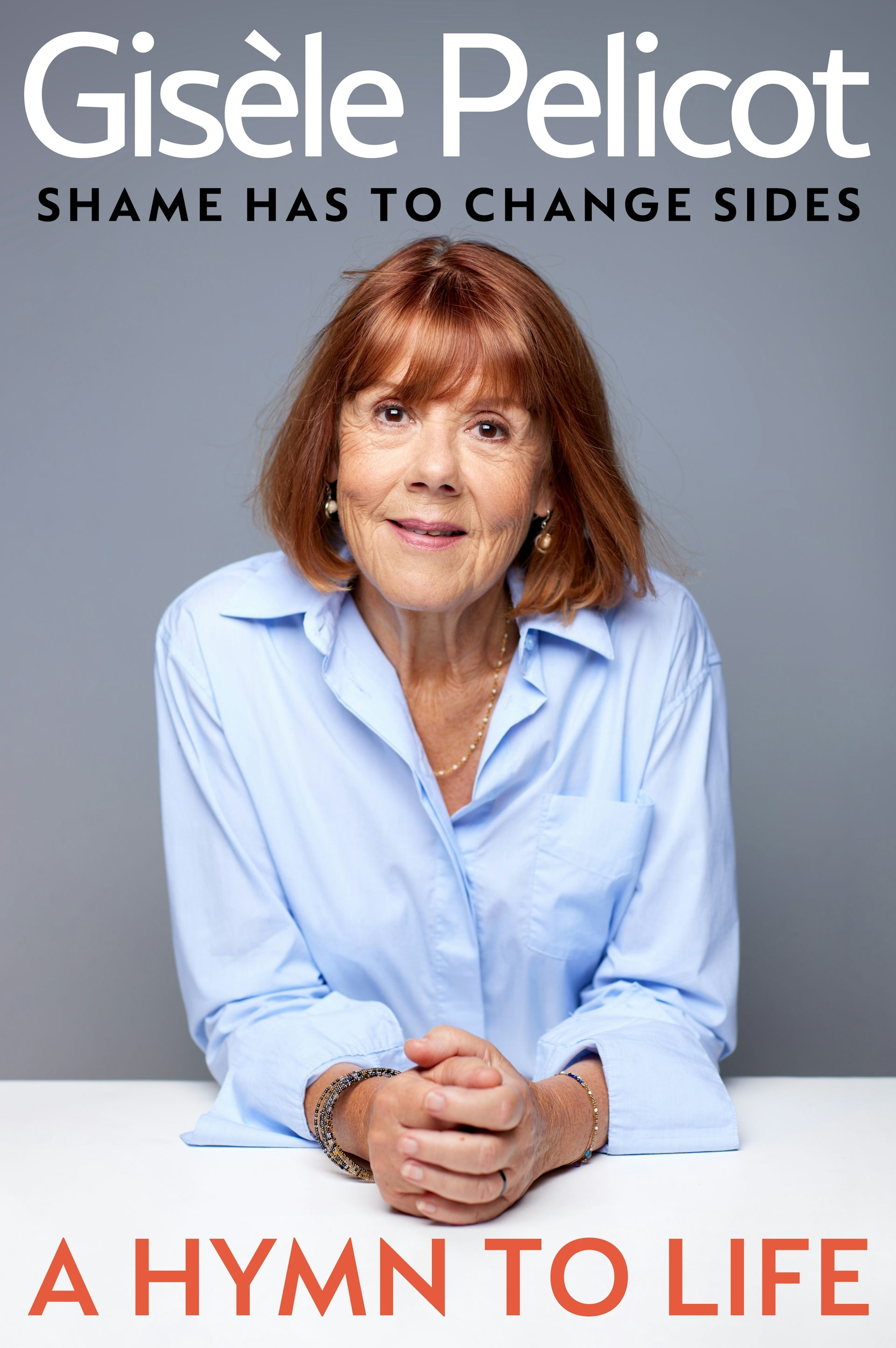 book cover: A Hymn to Life - a smiling woman in a blue and white striped shirt
