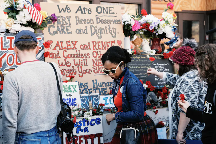 People pay respects to Alex Pretti and Renee Good.