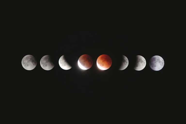 Composite image of a full moon undergoing an eclipse.