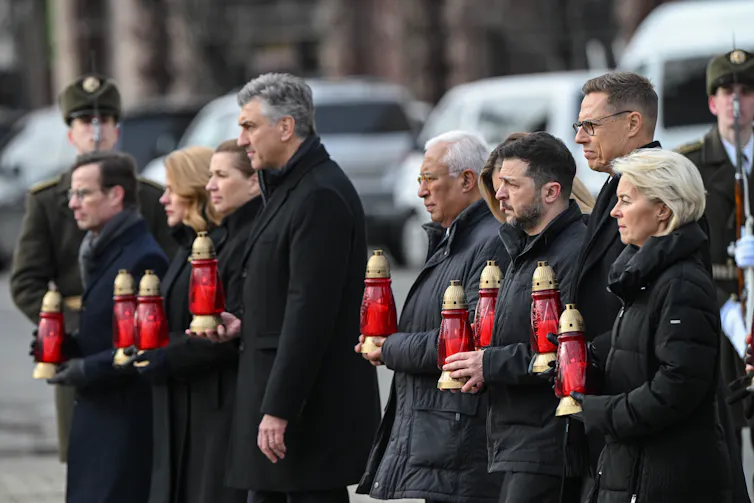 Ukrainian president Volodymyr Zelensky, European Commission president, Ursula von der Leyen, and other EU leaders hold candles to mark anniversary of invasion of Ukraine.
