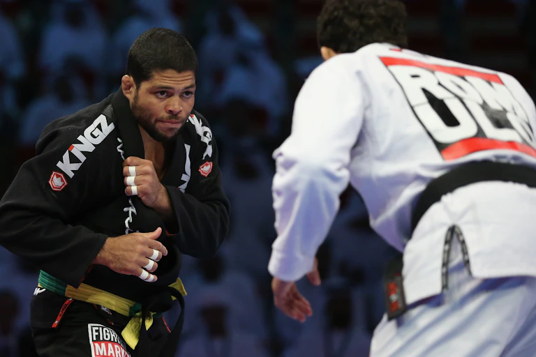Two men square off in a martial arts match.