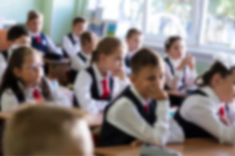 Blurred photo of children in uniform