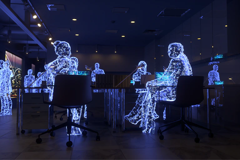 Digital replicas of people in an office setting