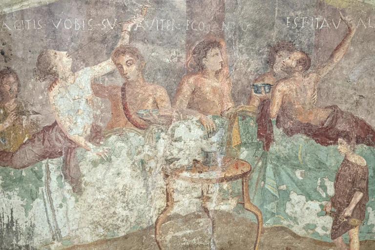 Roman fresco showing drinkers at a banquet