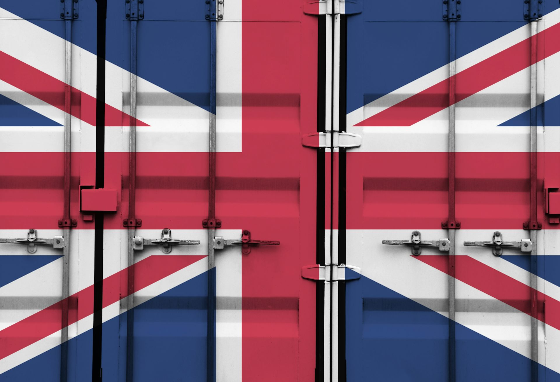 Shipping container with overlay of UK flag.