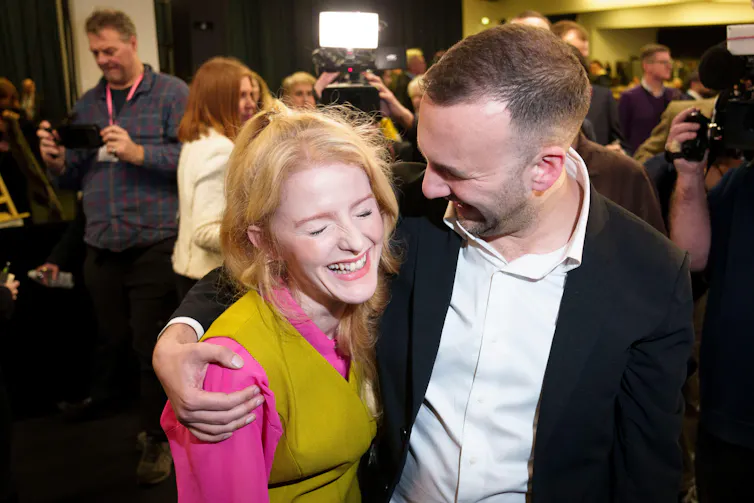 A smiling Spencer and Polanski embrace after the vote count