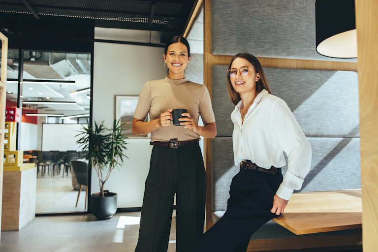 two young women in an office environment
