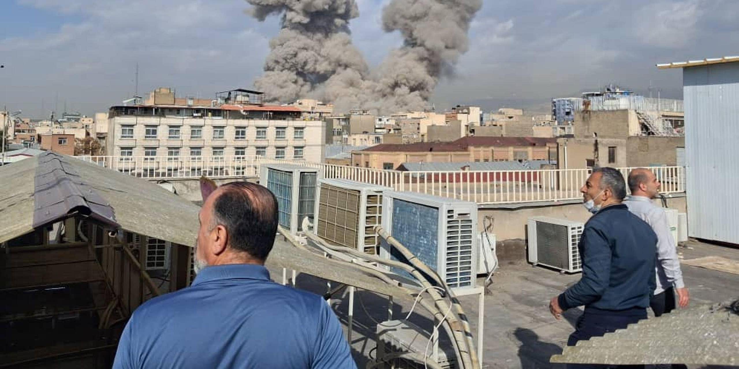 People watch airstrikes in Tehran