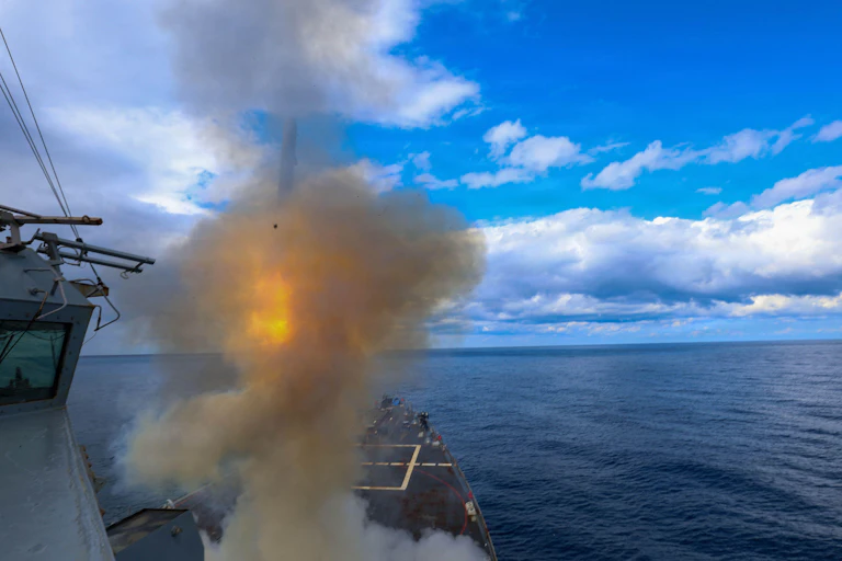 US warship Thomas Hudner launches a Tomahawk missile