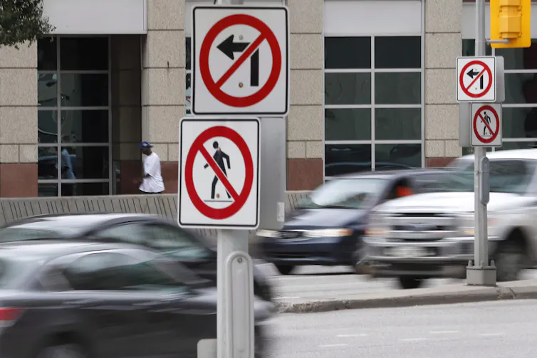 Blurred cars at an intersection