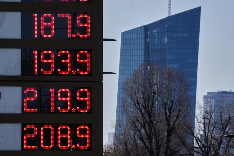 Gas prices displayed digitally at a gas station