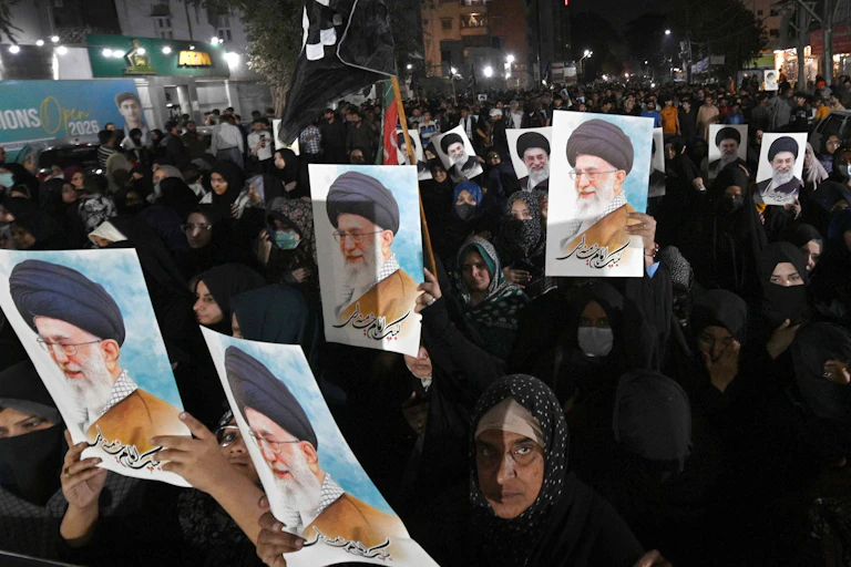 People rally following the death of Iranian Supreme Leader Ayatollah Ali Khamenei, in Karachi, Pakistan.