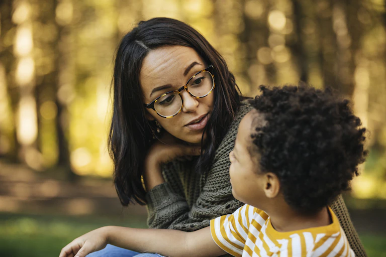 Mother talks to her child