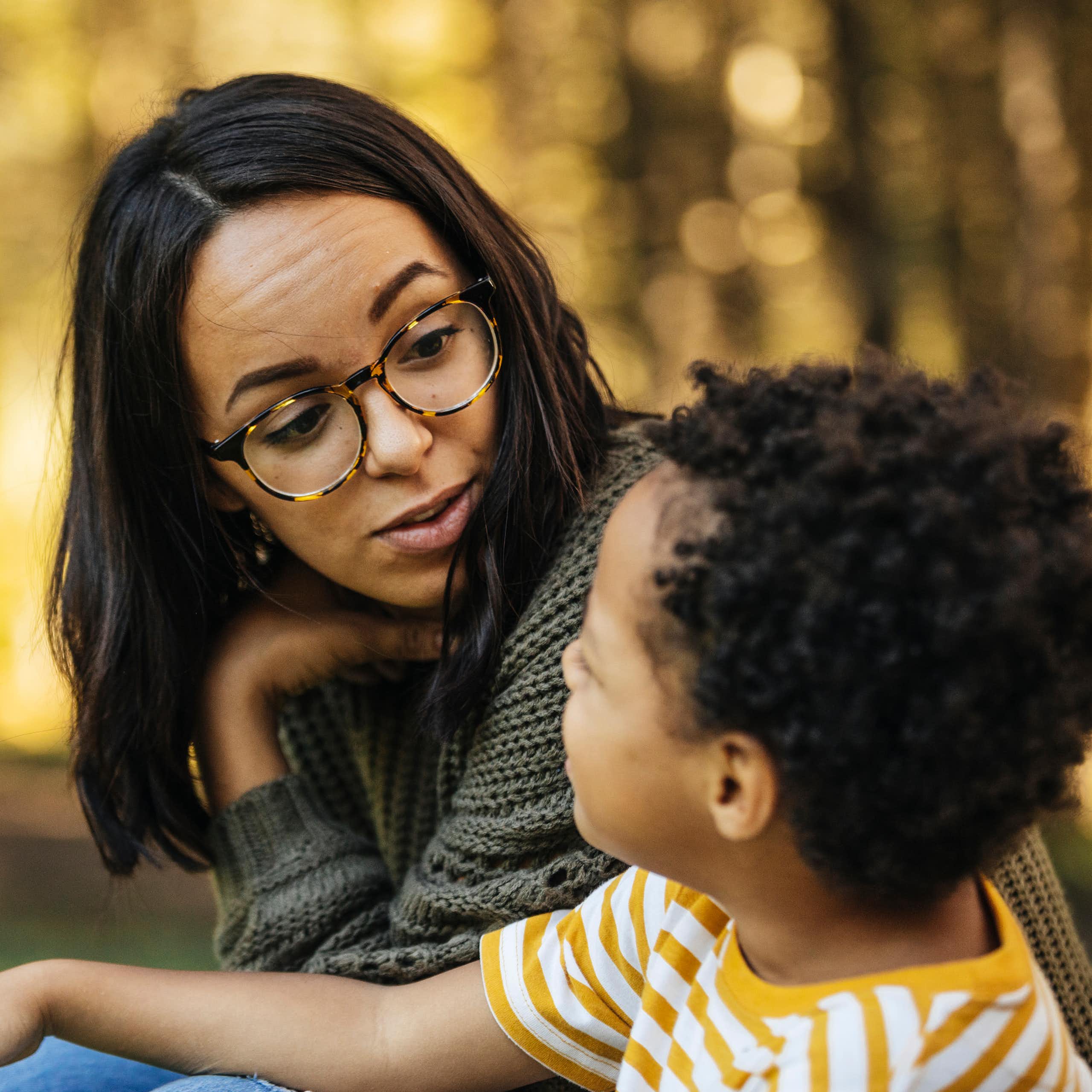 Mother talks to her child