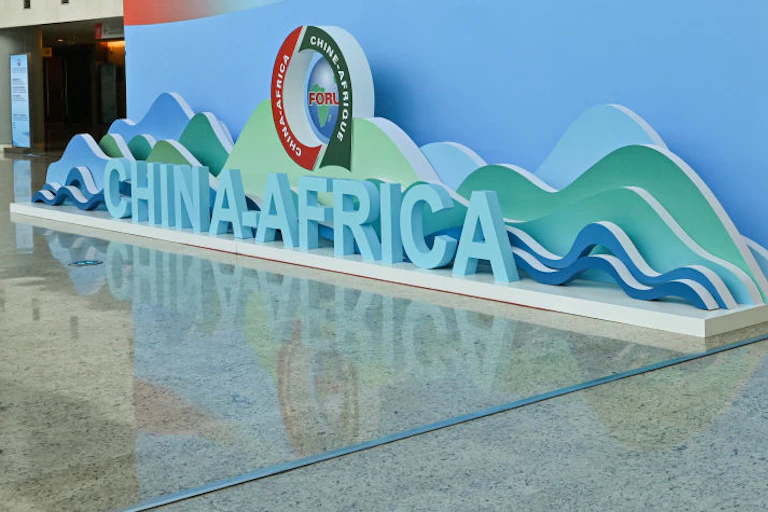 Logo saying China-Africa against the wall of a building