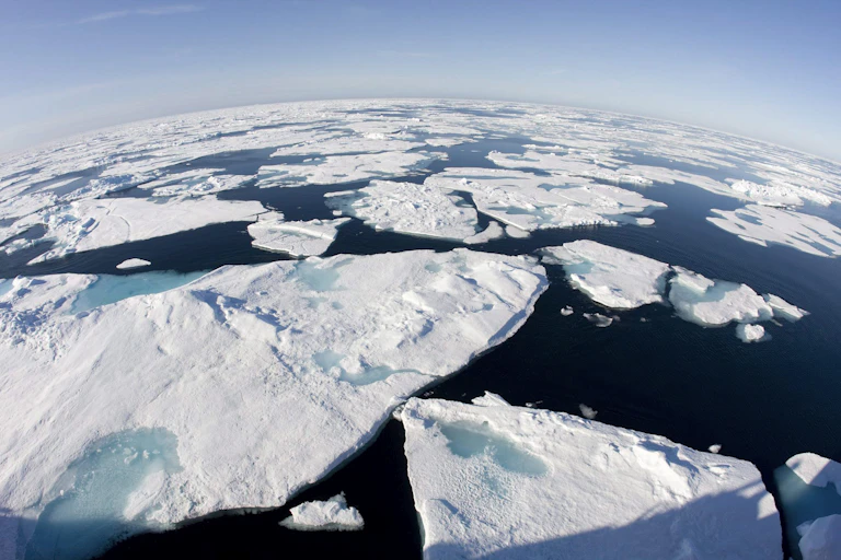 sheets of ice floating above the sea
