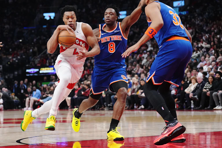Action from an NBA basketball game between the Toronto Raptors and the New York Knicks.