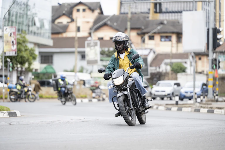 Man on a motorcycle in a city street