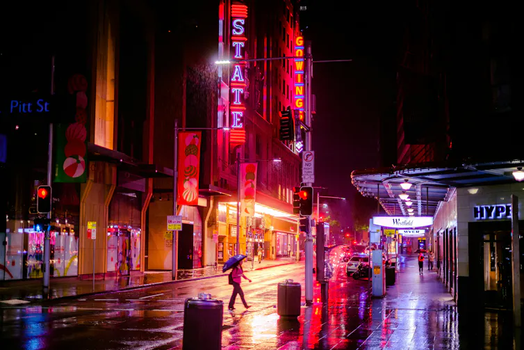 A Sydney street on a rainy night.
