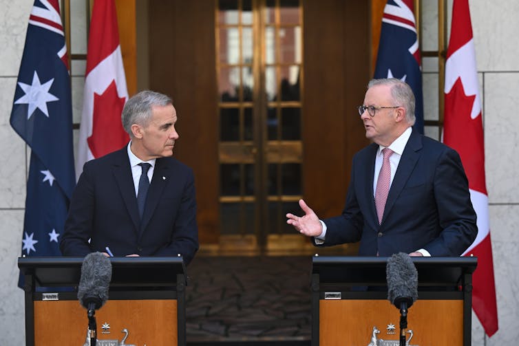 Canadian Prime Minister Mark Carney and Australian Prime Minister Anthony Albanese speak to the media during a joint press conference at the Australian Parliament House