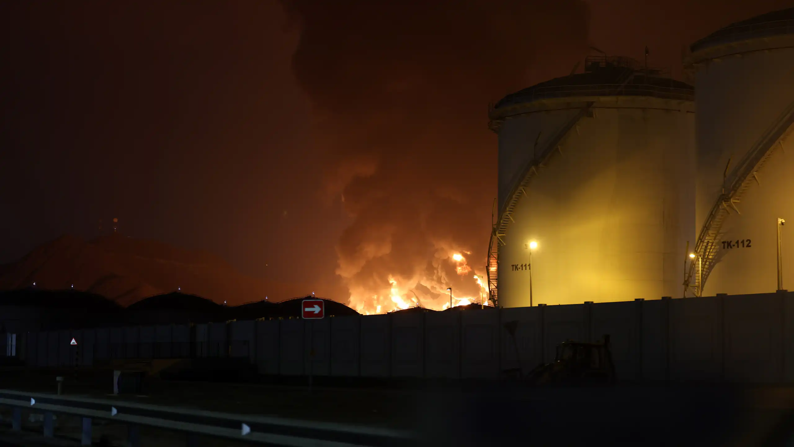 Flames at an oil facility in the UAE after Iranian drone attack.