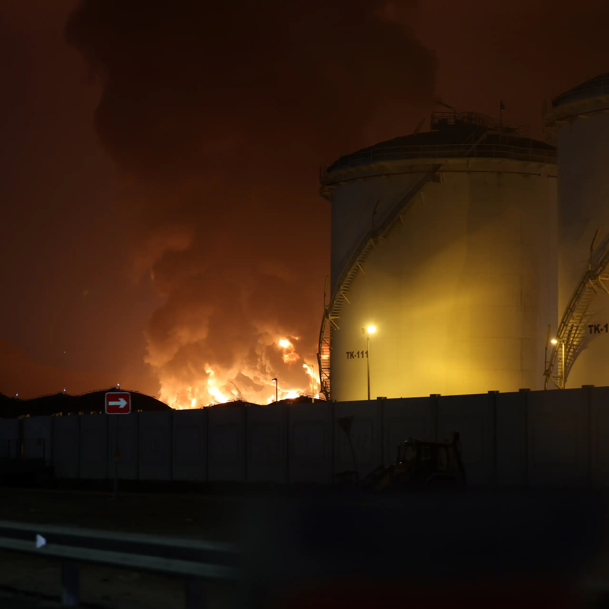Flames at an oil facility in the UAE after Iranian drone attack.