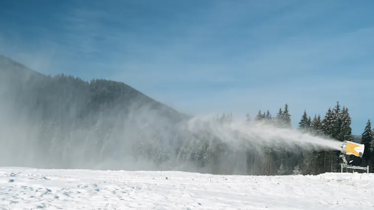 snow cannon beside a piste