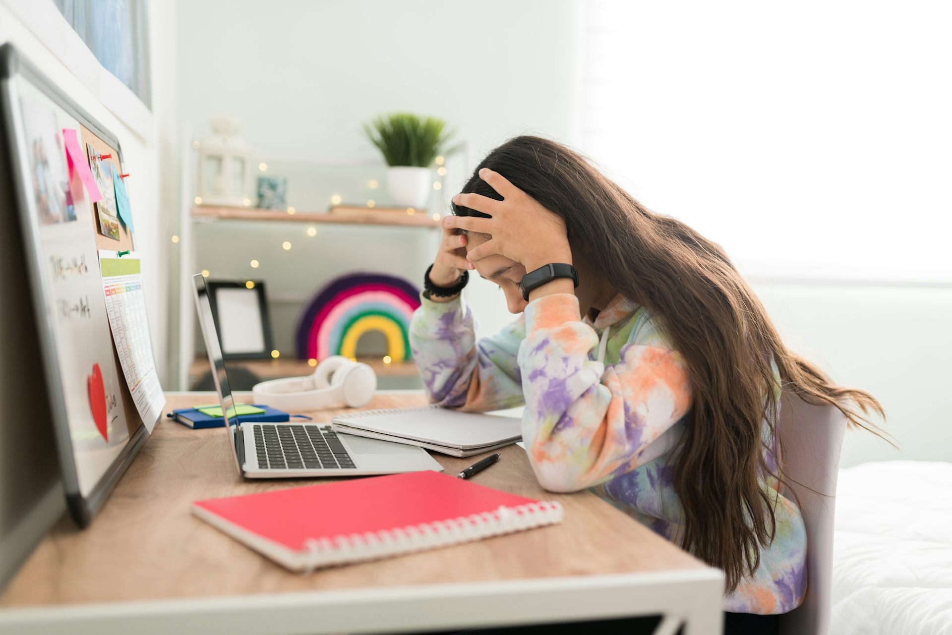 Girl stressed at homework desk