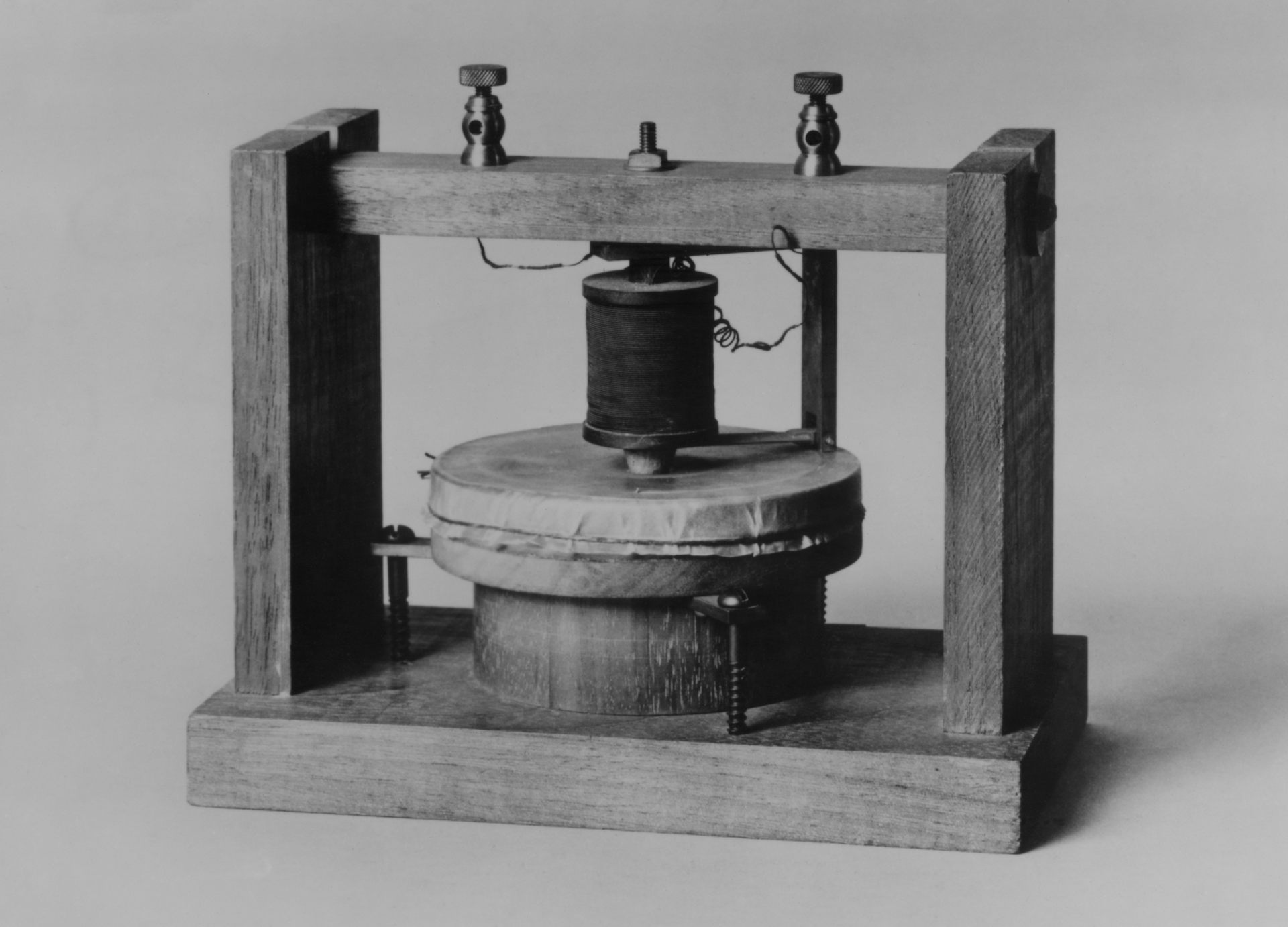 Alexander Graham Bell's telephone design featured a transmitter made of parchment stretched tight like a drum.