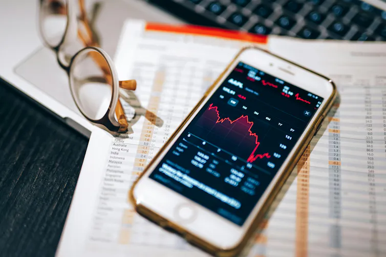 Mobile phone showing stock prices