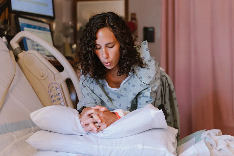 Woman in labour breathes deeply