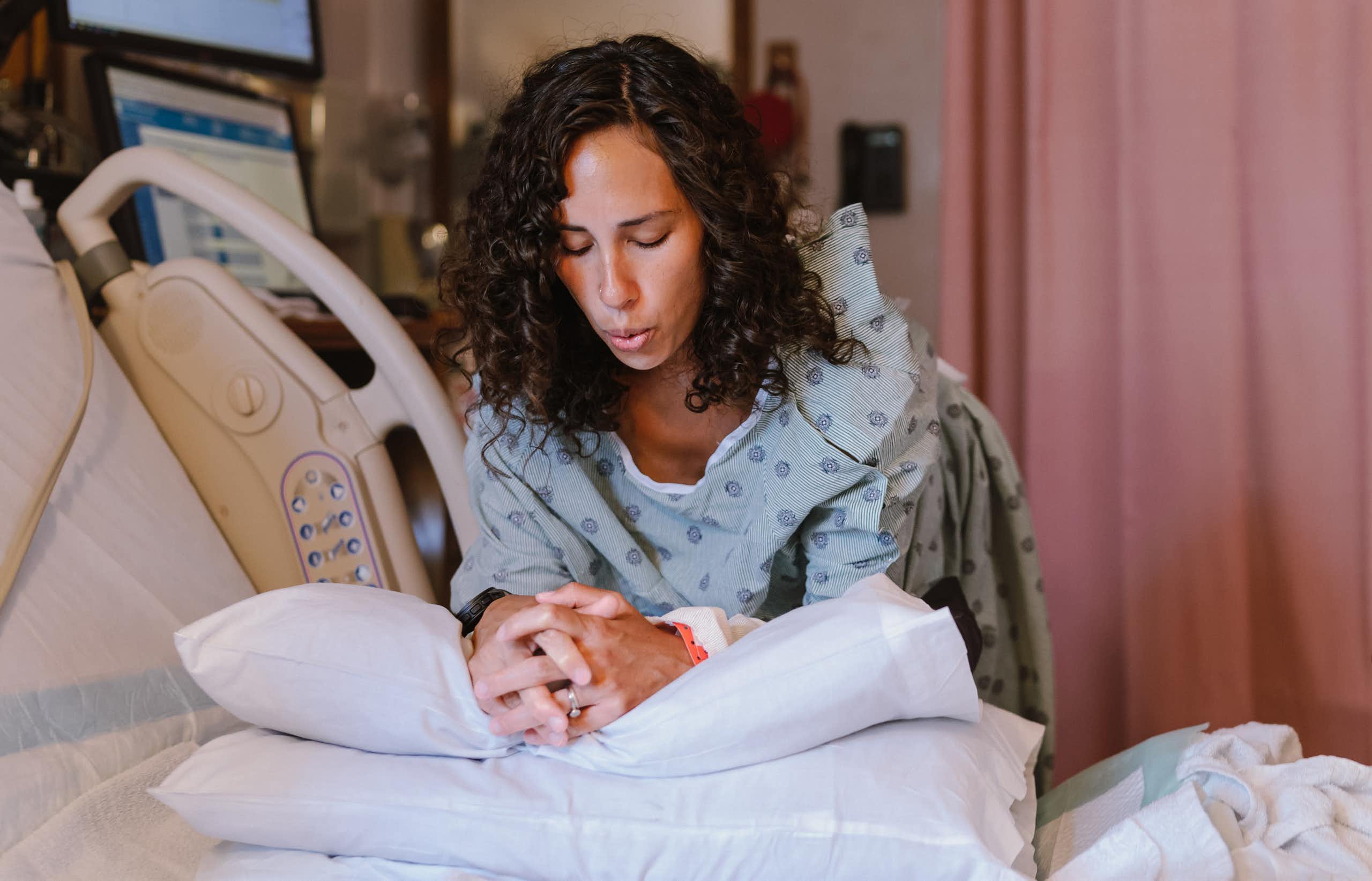 Woman in labour breathes deeply