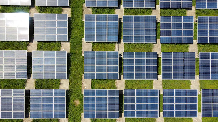 an aerial view of a group of solar panels