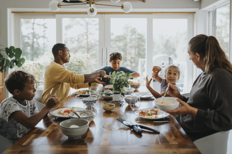 A family sits down to dinner