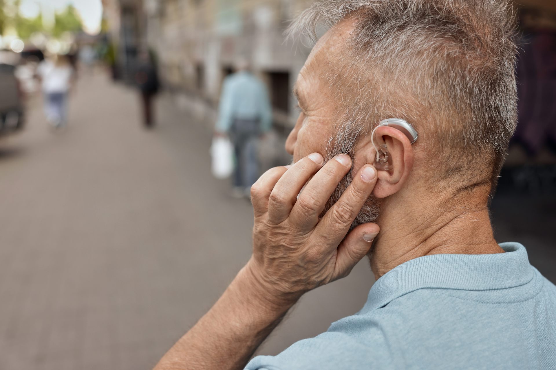 Man with hearing aid