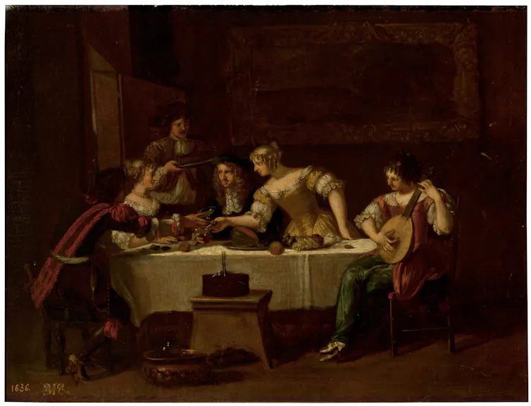 Pintura de una comida entre soldados y mujeres.