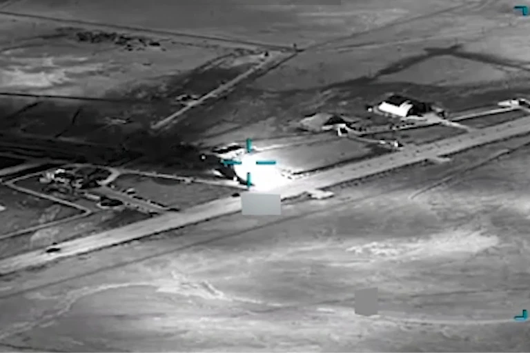 black and white aerial view of an airfield